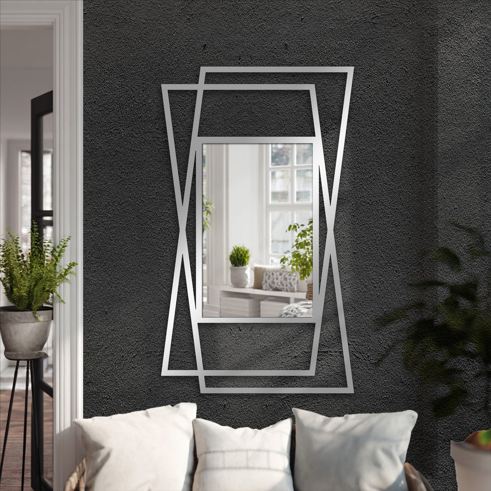 High color contrast emphasizes the sleek, angular overlap geometric frame floor mirror, a bold piece of decoration wall art featuring modern black lines.