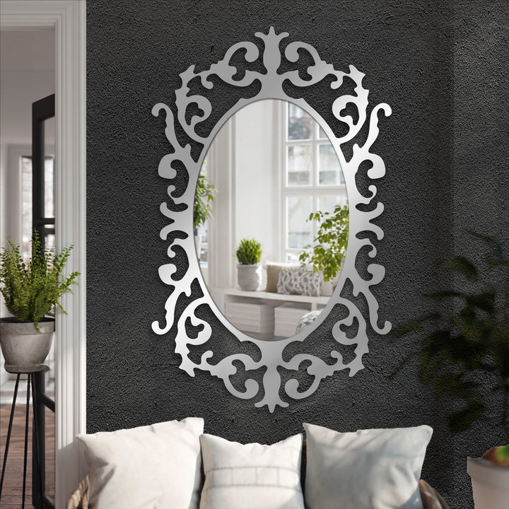 Visual rhythm is created by the repeating curves of the Victorian-style frame in this framed wall mirror, making it a striking decoration wall art piece.