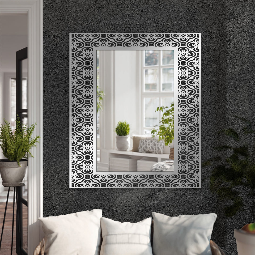 Rhythmic concentric circle patterns on this ornamental frame evoke a sense of flowing energy within this modern wall mirrors piece, offering a fresh take on traditional floor mirrors.