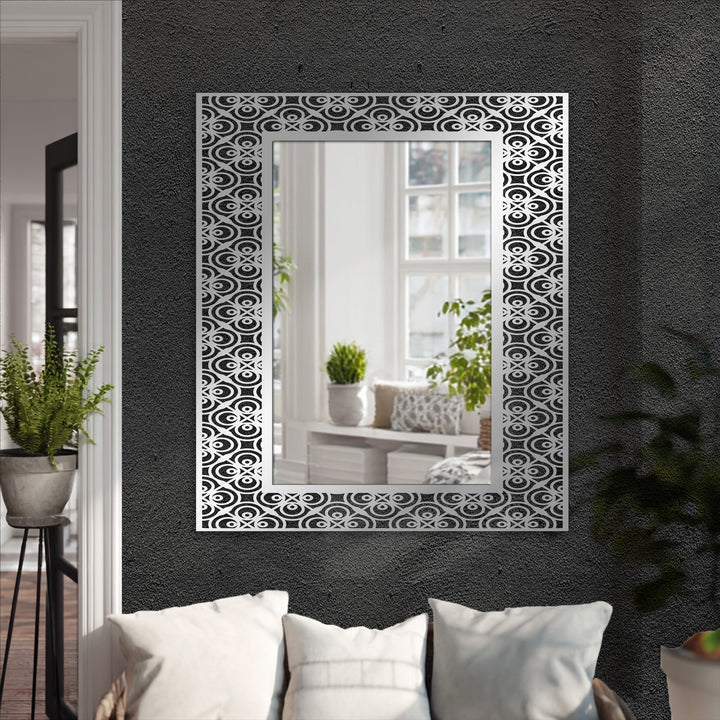 Rhythmic concentric circle patterns on this ornamental frame evoke a sense of flowing energy within this modern wall mirrors piece, offering a fresh take on traditional floor mirrors.