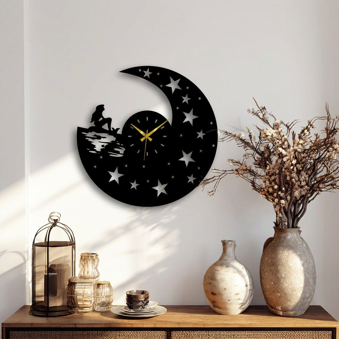 Negative space surrounds the moon, stars, and mermaid silhouette in this decoration wall art metal clock, creating a dreamy celestial night design.