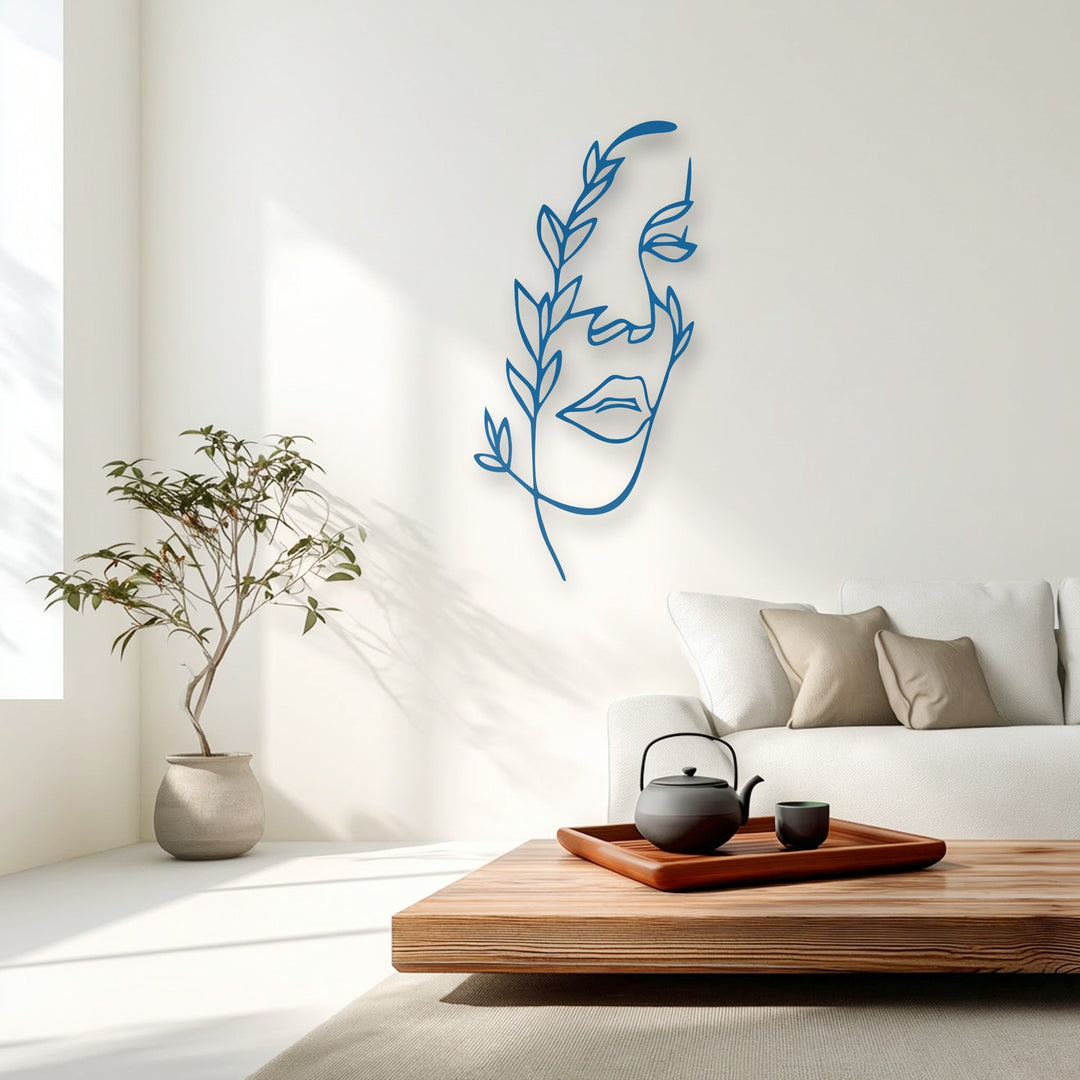 Subtle color transitions from the pristine white wall to gentle shadows enhance the azure Minimalist Female Line Art metal art for wall.