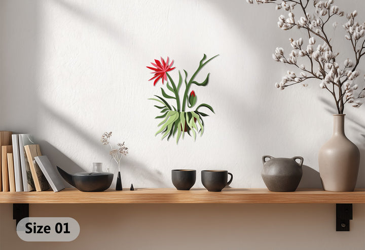 Depicting the transition between verdant greens and fiery reds, this metal wall art showcases a vibrant color gradient in a botanical modern metal wall decor piece.