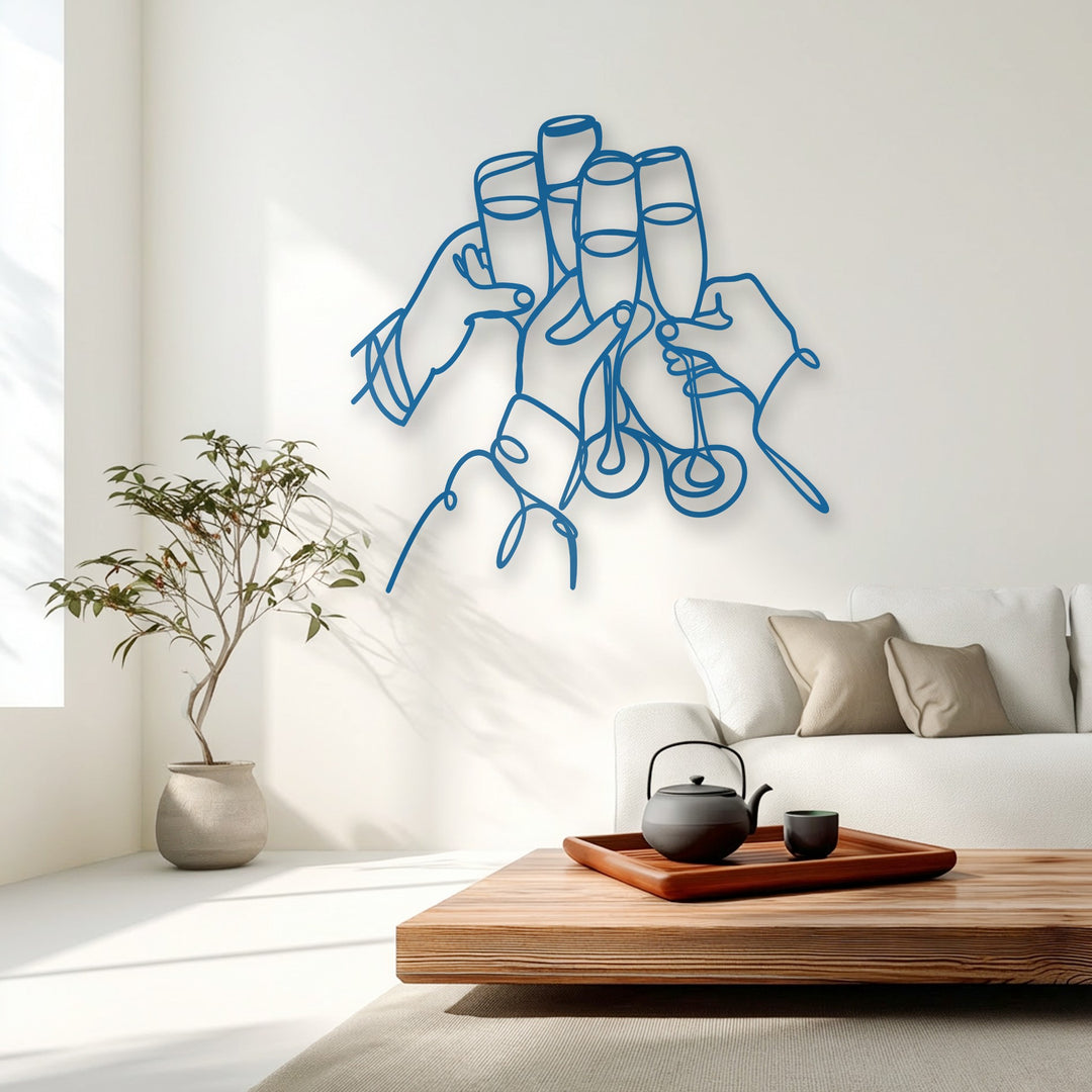 Radiant light casts crisp shadows from the bold blue Celebration Line Art decorative metal art onto a clean white wall, creating striking visual depth.