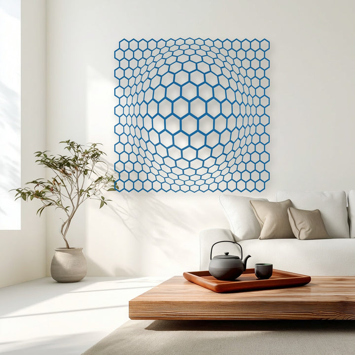 The vibrant blue geometric hexagonal pattern creates a striking 3D depth illusion, making for unique metal wall art.