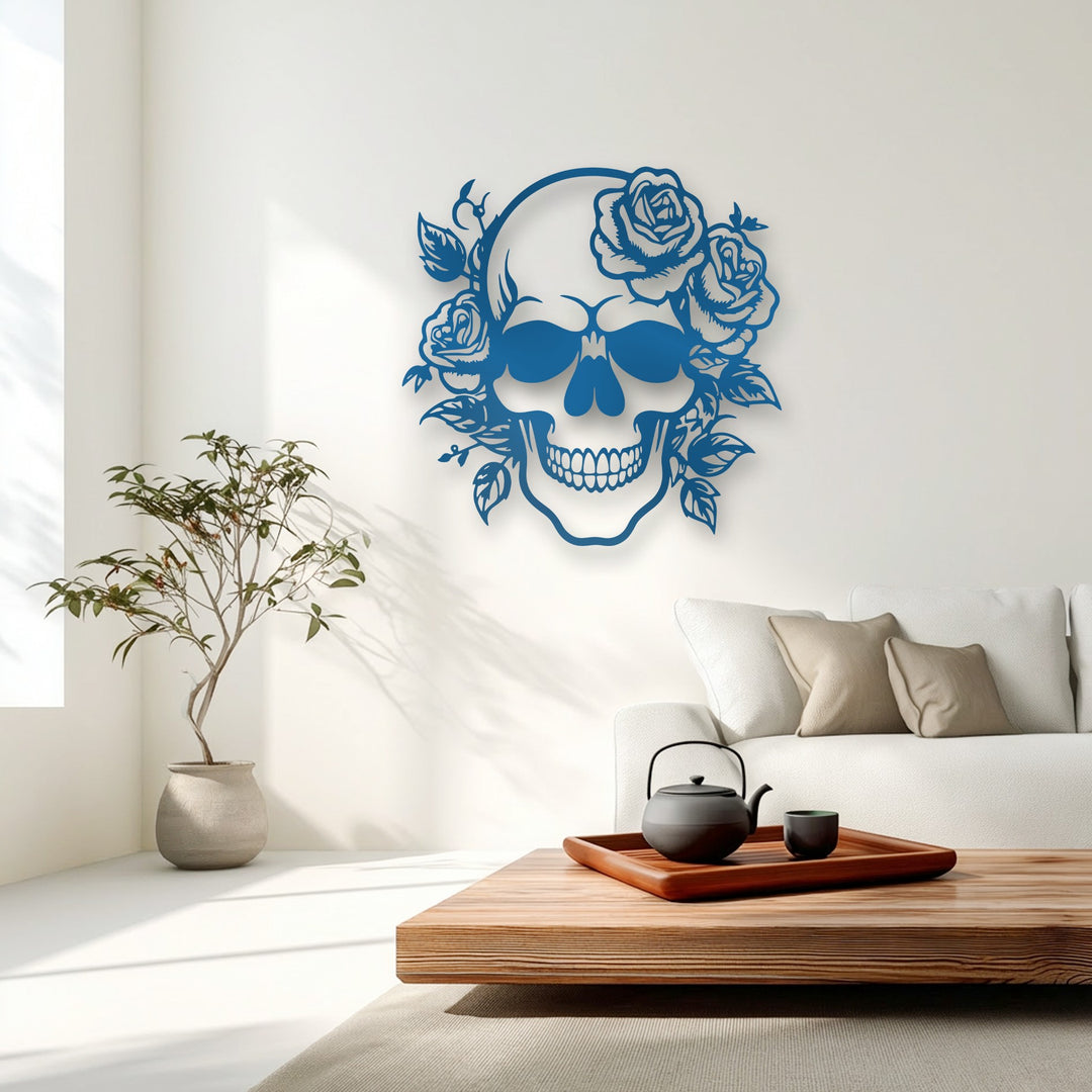 The smooth, matte finish of this decorative metal art, a gothic rose skull, casts subtle shadows on the wall, highlighting its layered texture.