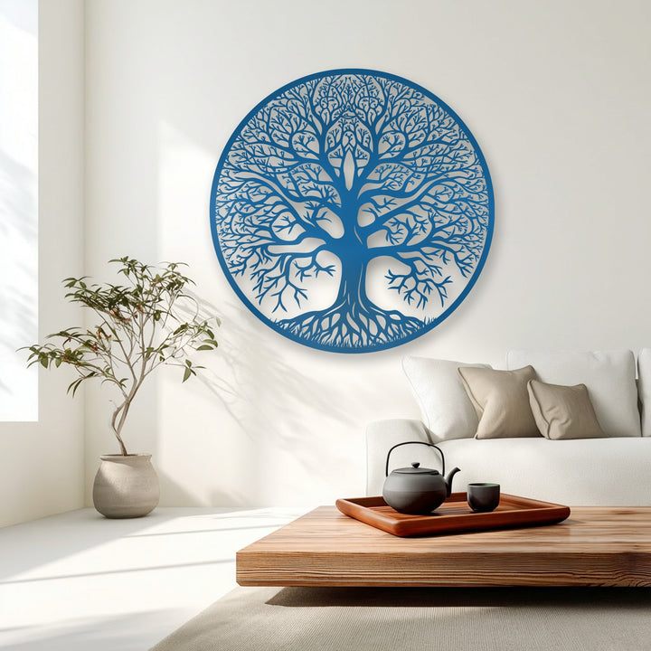 With striking color saturation, a vibrant blue Tree of Life unique metal wall art stands out against the muted tones of a minimalist living space.