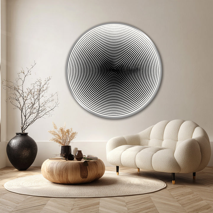 Foreground detail shows a minimalist round wooden oil painting, blending into the stylish oil painting home decor of this contemporary living space.