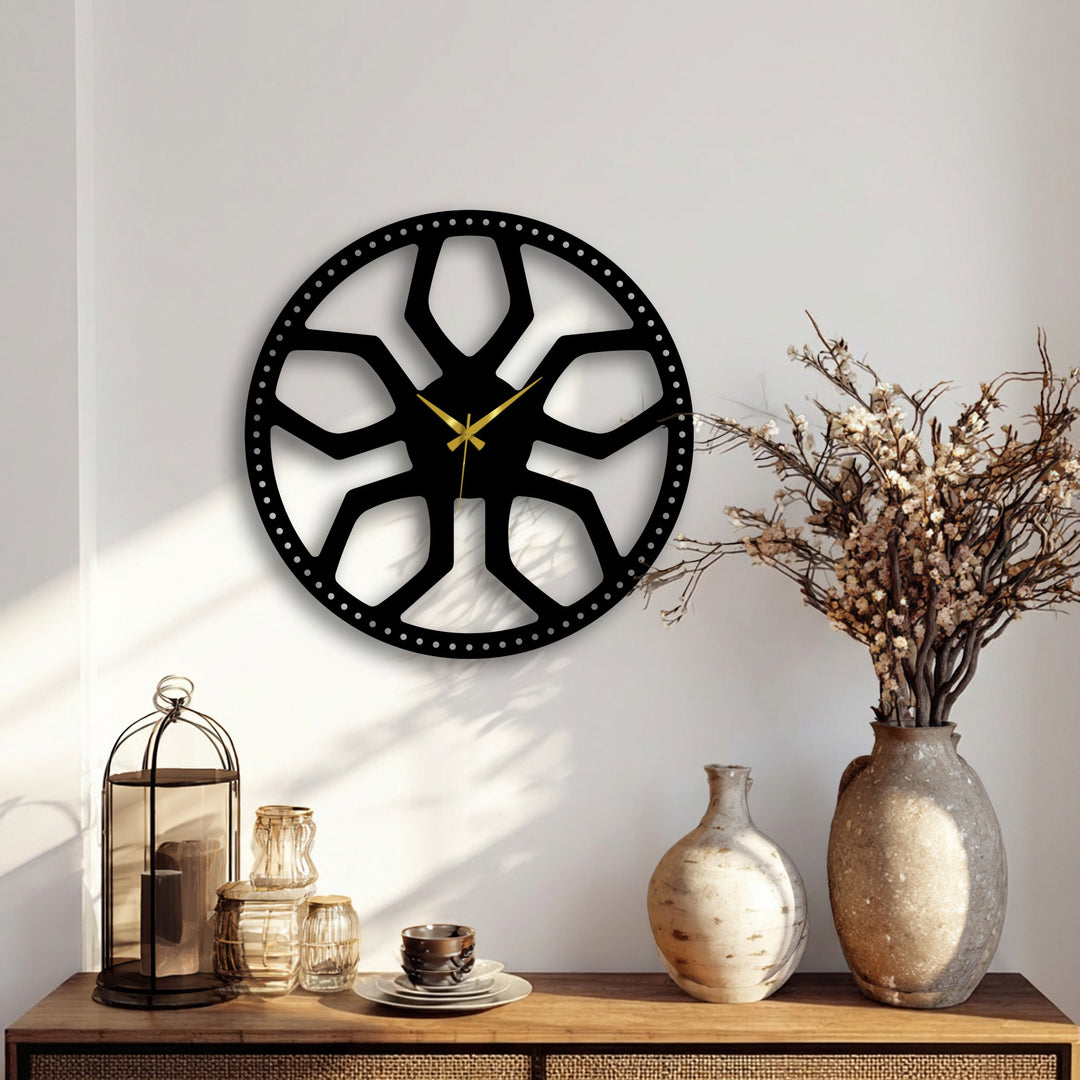 Intricate light and shadow patterns define the Abstract Radial Pattern Metal Wall Clock, showcasing this striking metal art for wall with golden hands.