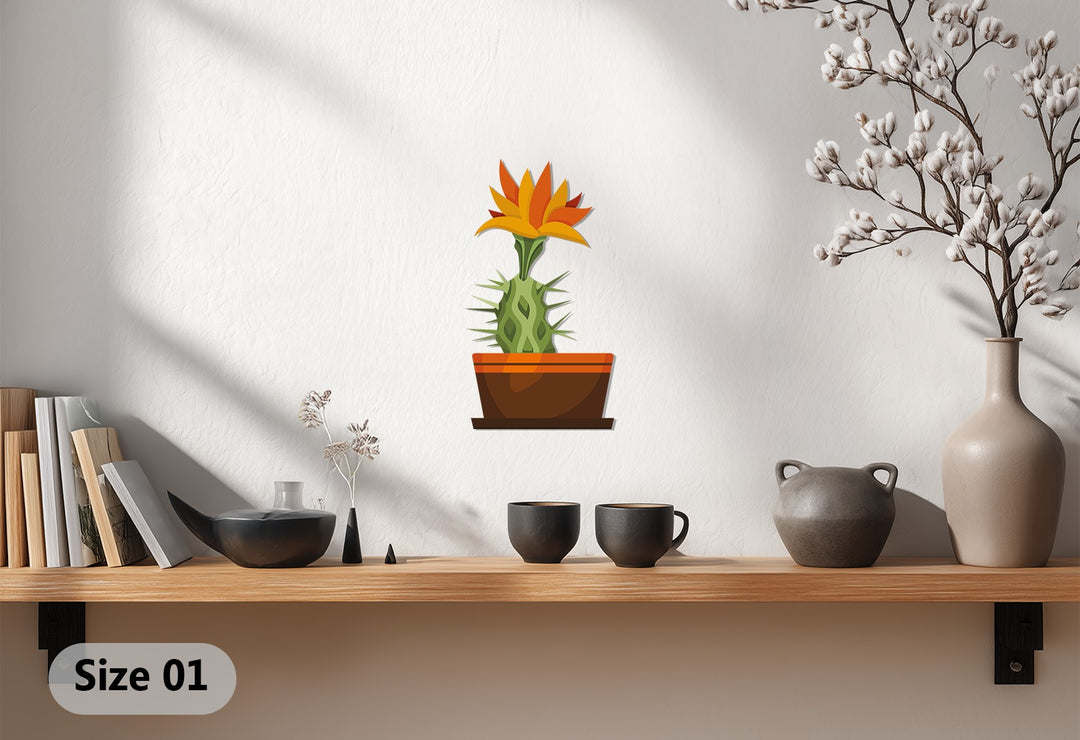Sharp borders define this metal artwork of a potted sunrise cactus bloom, creating a modern botanical metal artwork piece.