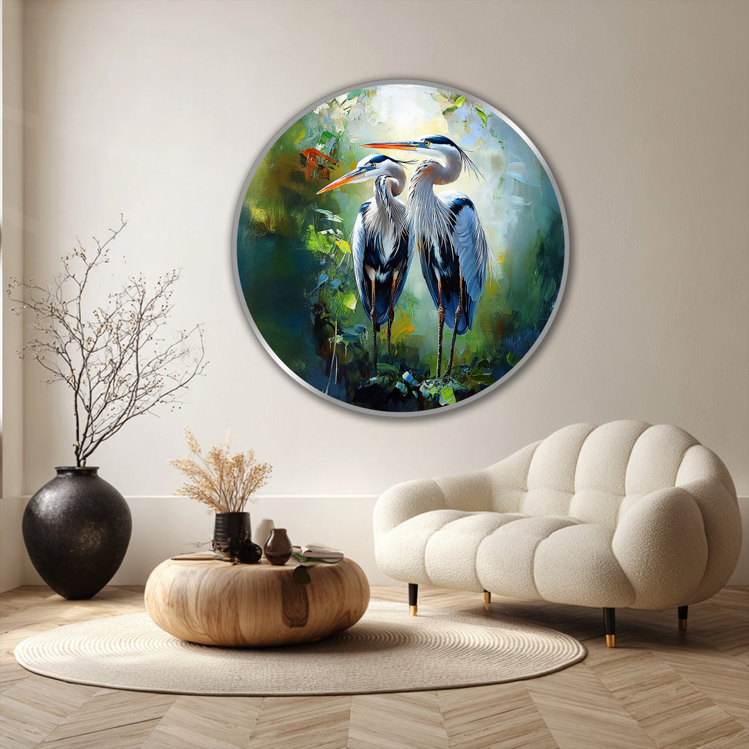 The focal point highlights this elegant oil painting artwork of a graceful heron pair in lush green tones, a round wildlife wall art exuding harmony and companionship.
