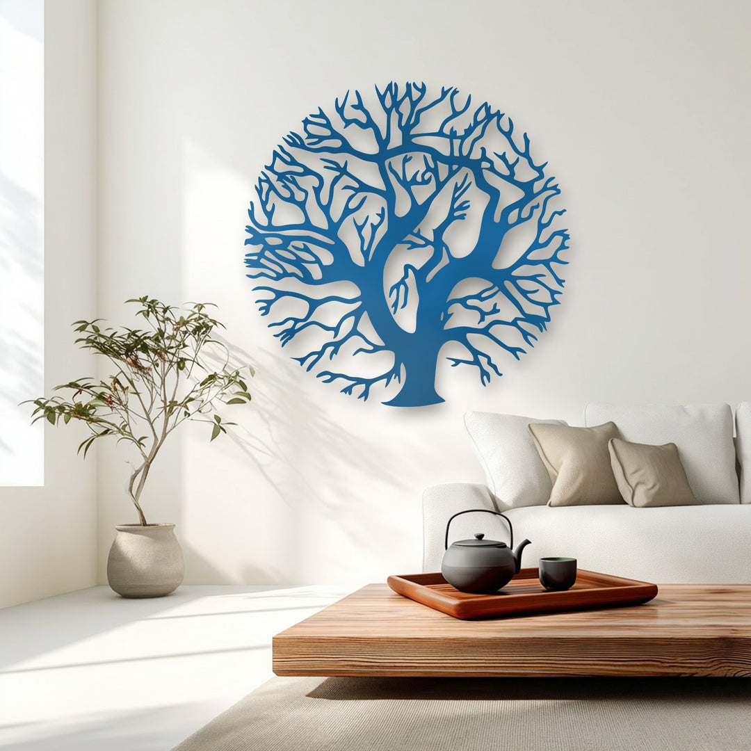 The stillness in this bright, minimalist living space is captured by the elegant blue Tree of Life metal artwork.
