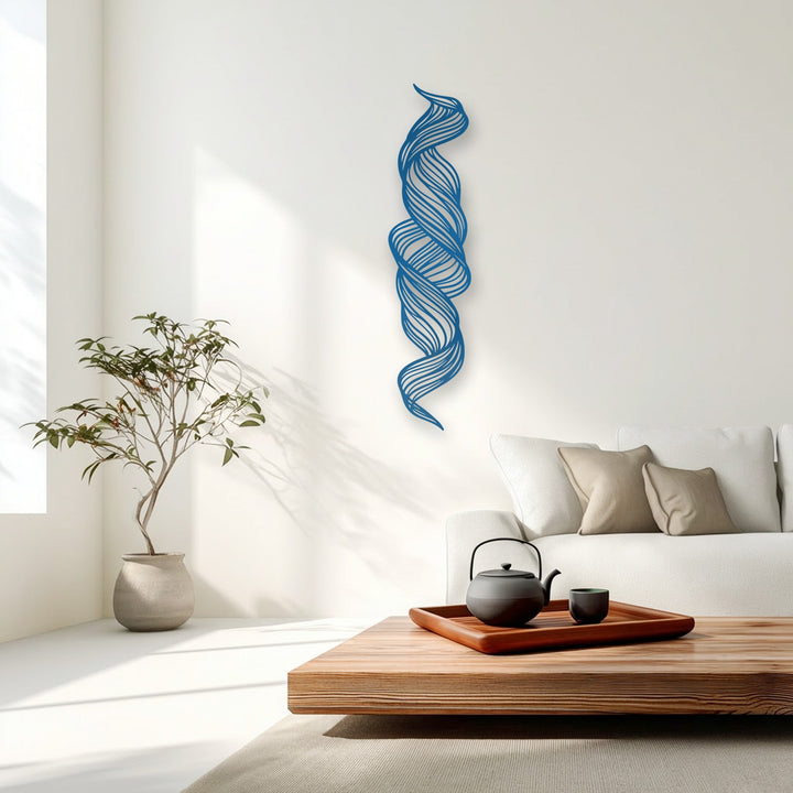 The visual rhythm of this cobalt blue abstract metal decoration wall art creates dynamic flowing lines in a modern setting.
