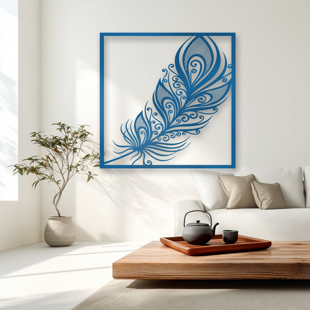 Dynamic swirls within the ornate blue feather metal art for wall gracefully sweep across the white space, implying delicate, airy motion.