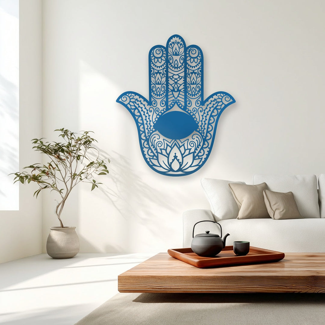 The deep blue ornamental Hamsa Hand metal artwork displays a mesmerizing visual rhythm with its intricate spiritual patterns.