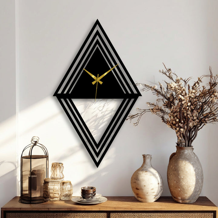 Subtle light and shadow define the layered geometric diamond metal wall clock, a striking piece of decoration wall art, casting shadows upon the wall behind.
