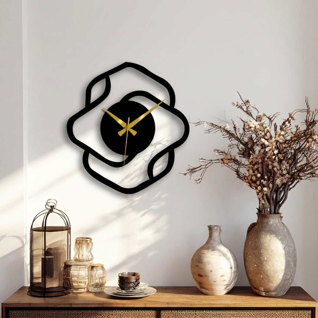 Showcasing the abstract quality, this modern decorative metal art clock features an organic shape with elegantly crafted gold hands, adding a sophisticated touch.