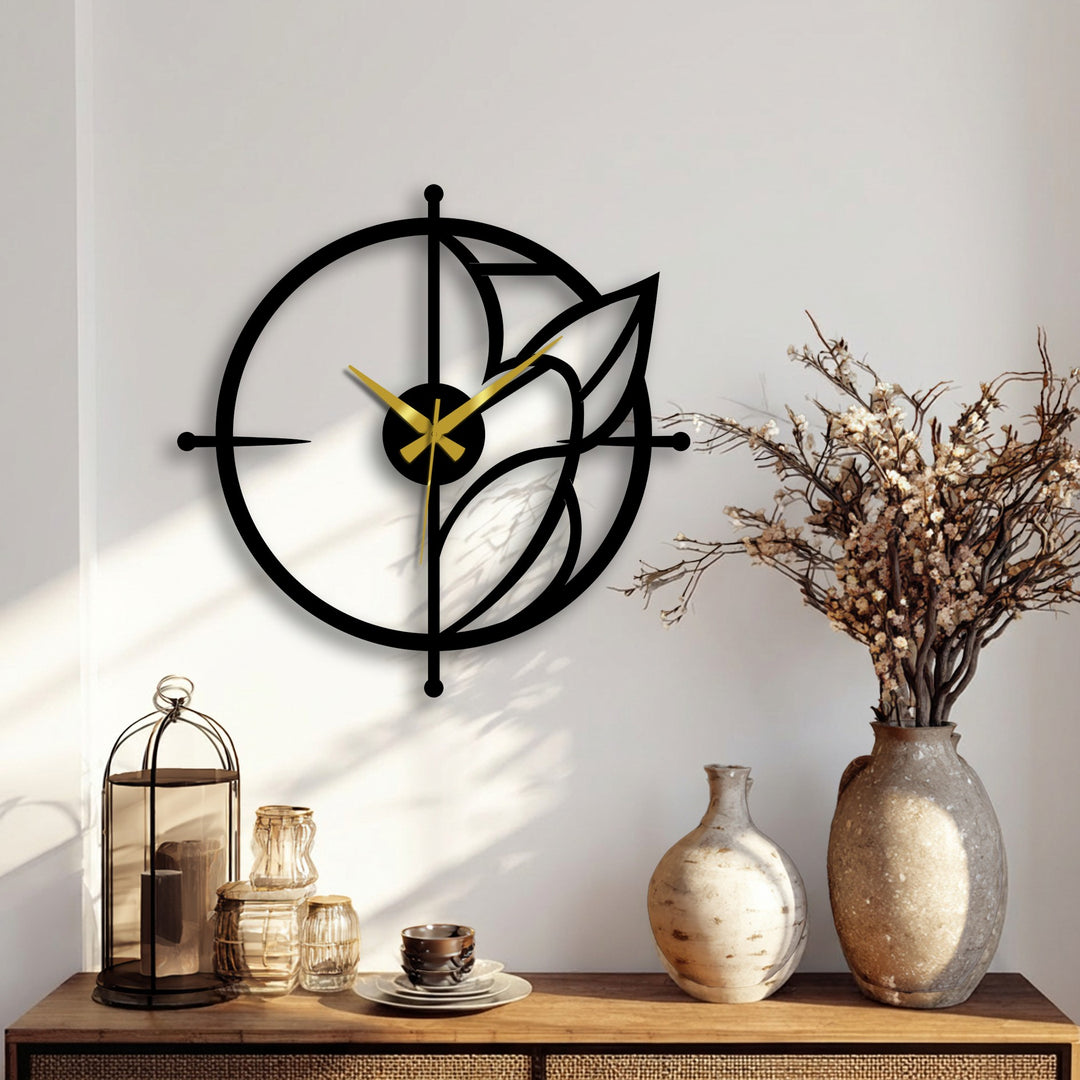 Meticulously crafted from premium metal, the modern leaf accent wall clock showcases exceptional decoration wall art, highlighting the sturdy composition and striking gold hands.