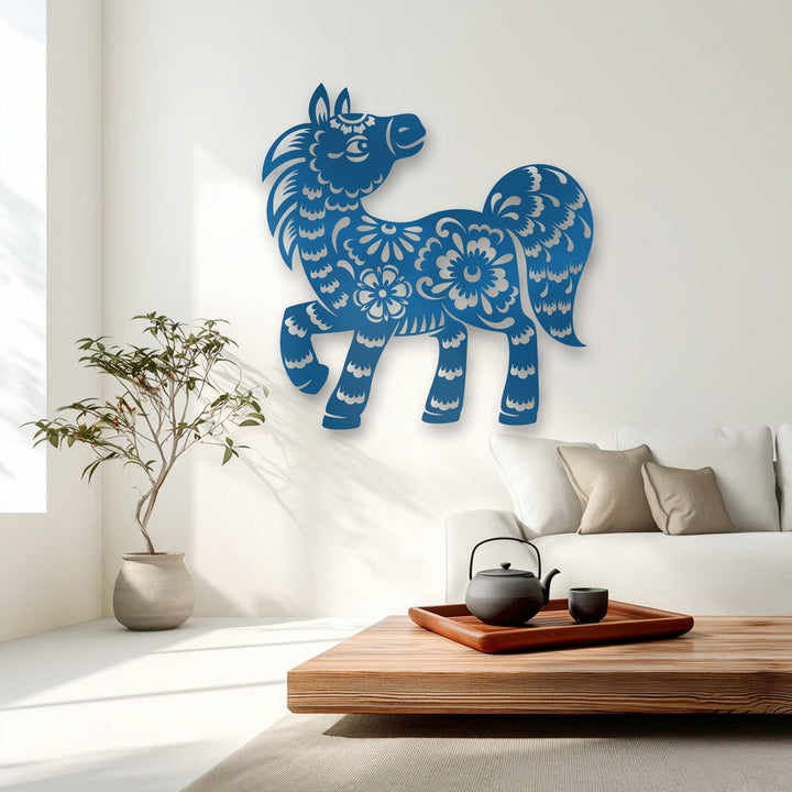 The realistic detail of the azure floral pony silhouette, a unique metal wall art piece, features intricate cutouts against a bright white wall.