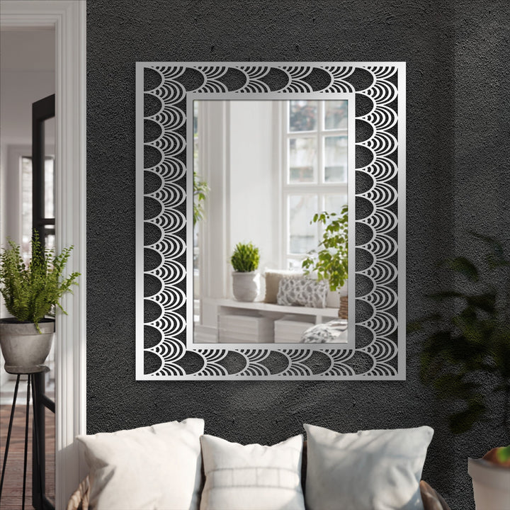 Gleaming, the mirror reflects light as a stained glass wall mirror with an art deco wave pattern frame offers a modern and stylish touch.