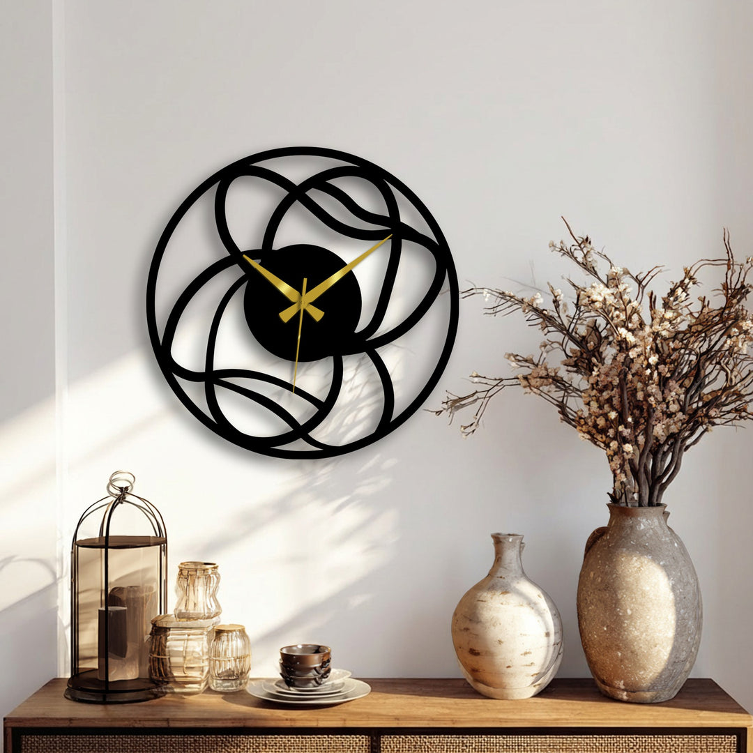 Highlighting the focal point, this modern interwoven abstract metal wall clock serves as a striking piece of metal wall decor, blending contemporary design with geometric charm.
