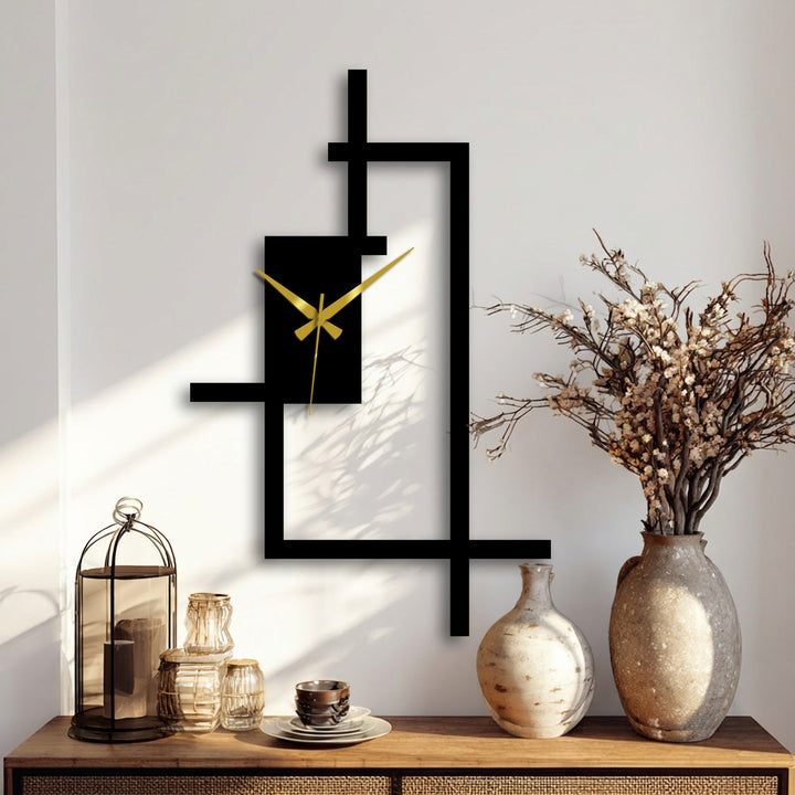 The geometric elements of this abstract line frame metal wall clock create a unique decoration wall art piece with its modern, linear design and gold clock hands.