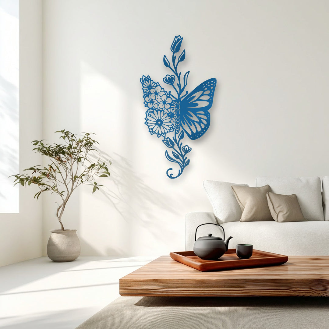 The central subject is an elegant azure metal artwork, a harmonious fusion of a butterfly wing and intricate floral designs.