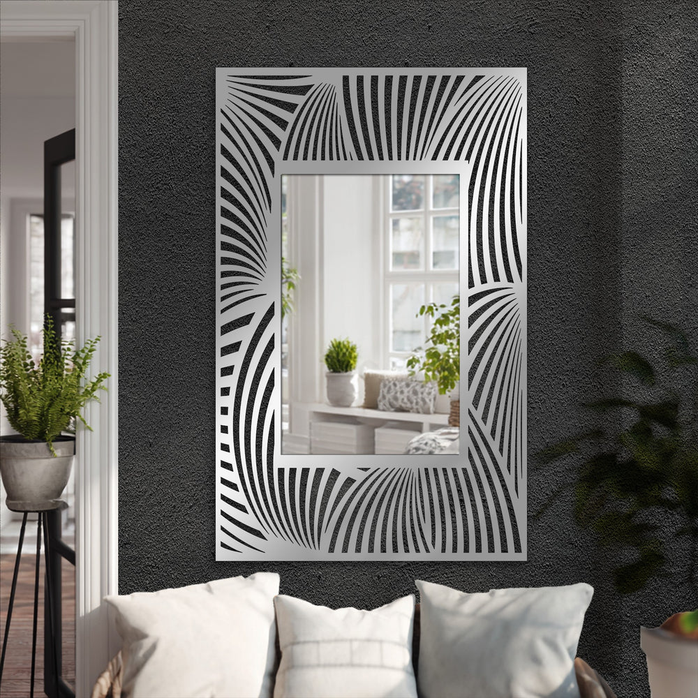 Organic, stylized forms create a dynamic, flowing wave pattern around this rectangular mirror, a bold example of decorating with wall mirrors.