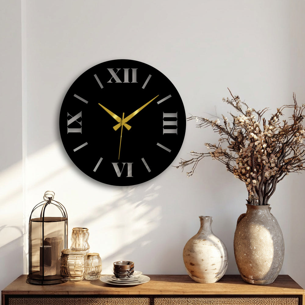 Warm color temperature highlights the gold hands and silver numerals on this stylish modern metal artwork wall clock, creating a striking contrast against the black face.
