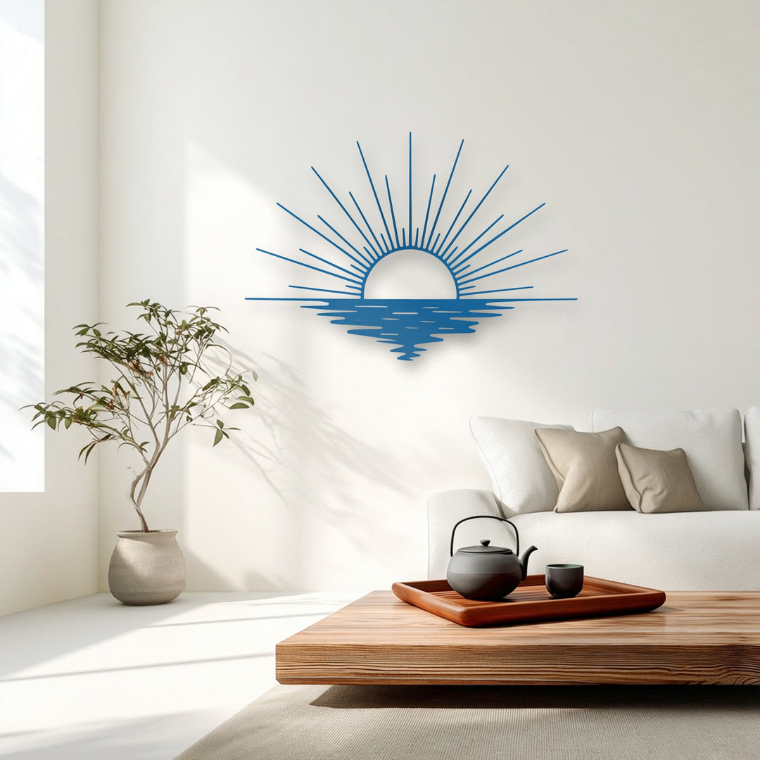 Horizontally oriented metal decoration wall art, geometrically shaped with an arched sun and radiating linear rays over serene ocean waves.