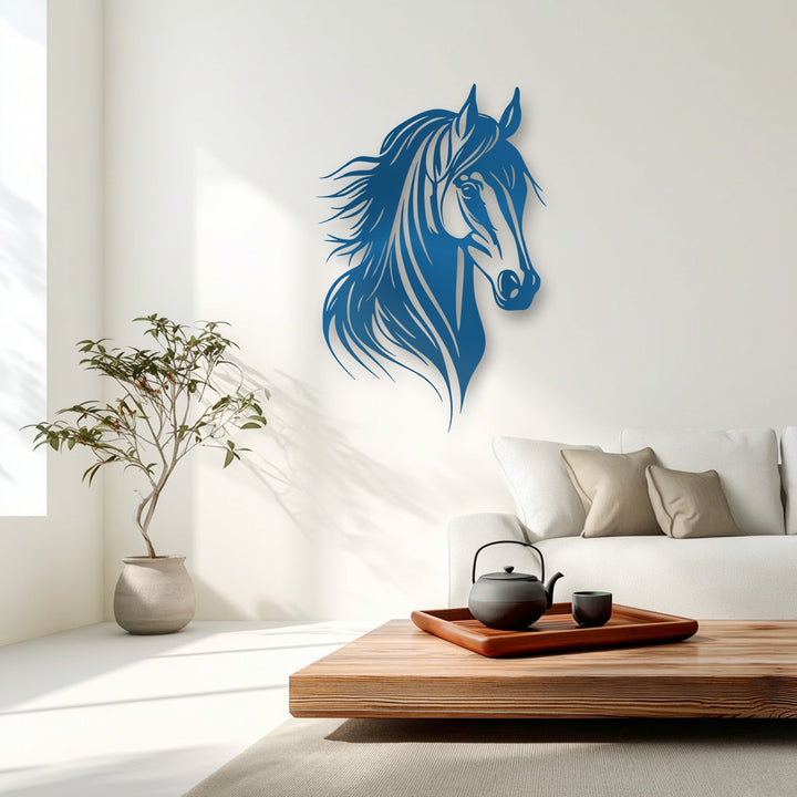 The stillness of the minimalist room is enhanced by the serene blue graceful horse head decorative metal art, casting calm shadows on the wall.