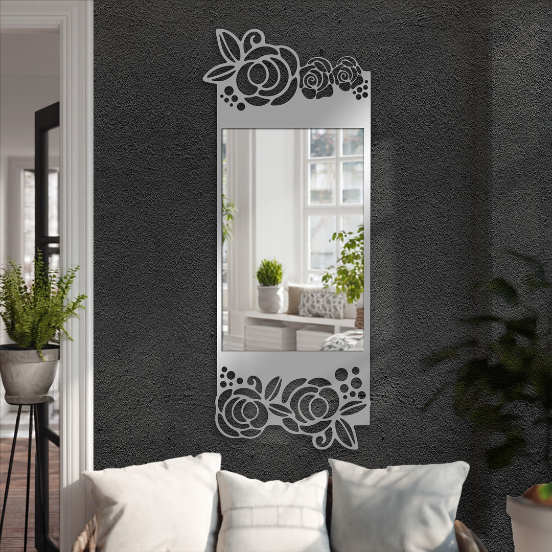 Floral details on this black metal floor mirror highlight decorating with wall mirrors, bringing elegance and modern style to any space.