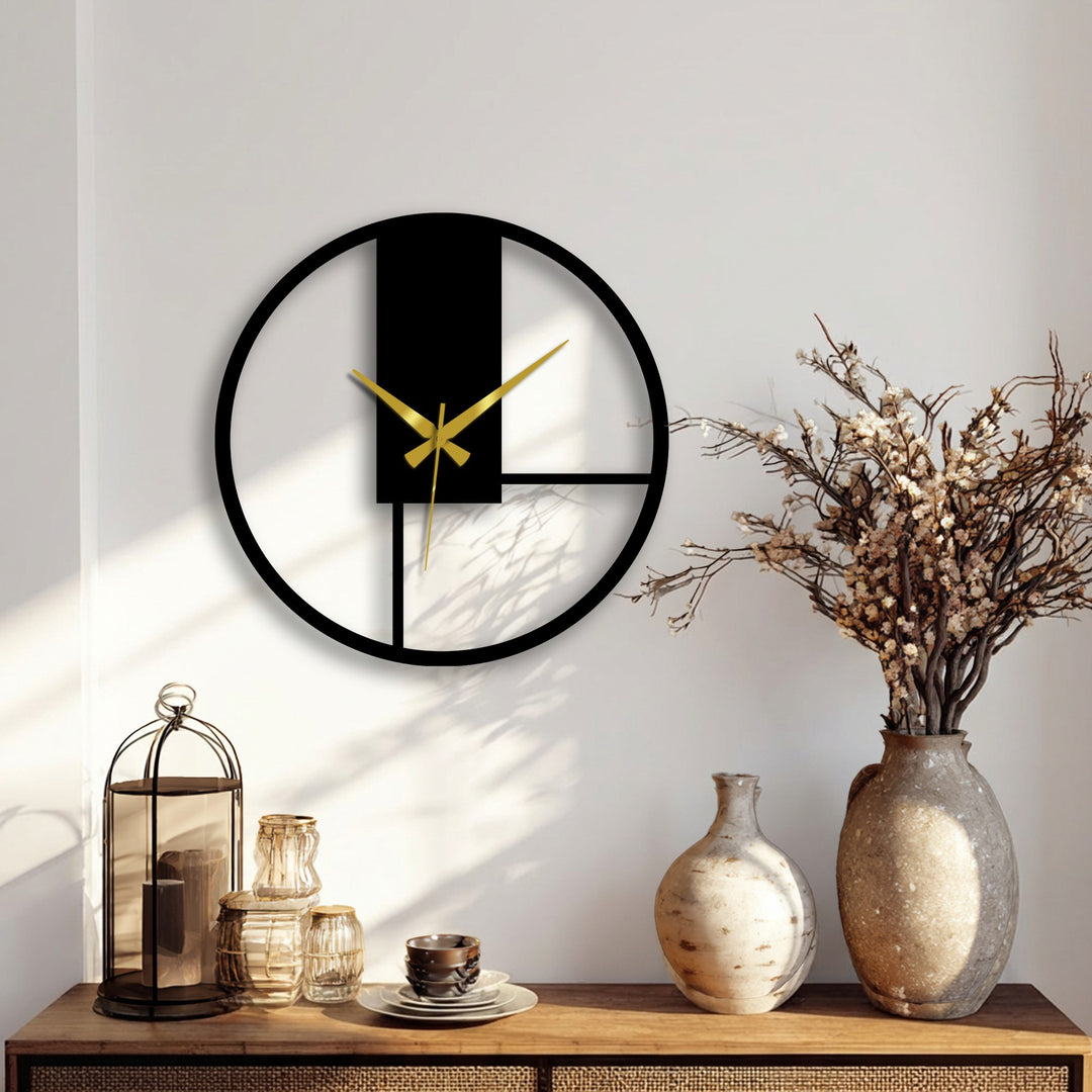 White background behind a minimal geometric panel metal wall clock is illuminated by soft light, adding depth to the metal art for wall display above a wooden table.