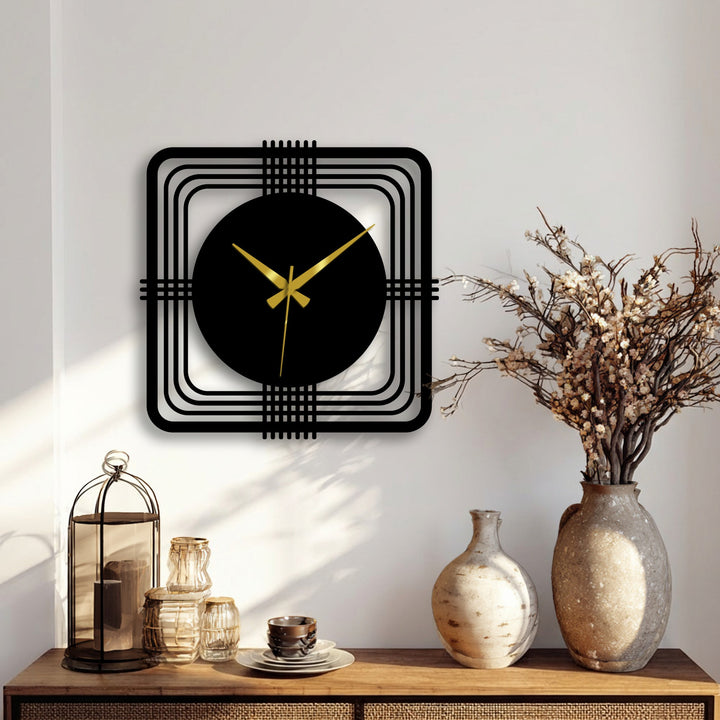 With subdued color saturation, the modern metal wall clock features a striking black geometric square frame as a minimalist decoration wall art.