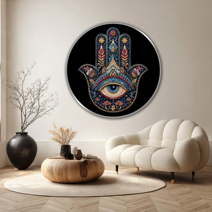 Silver edges frame this round oil painting home decor featuring an ornate Hamsa hand with a protective eye, contrasting with the black border.