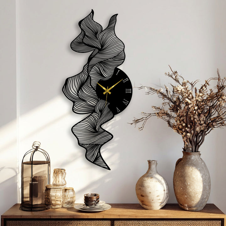 Softly shadowing the wall, the flowing lines of this abstract wave metal wall clock create a sophisticated metal artwork.