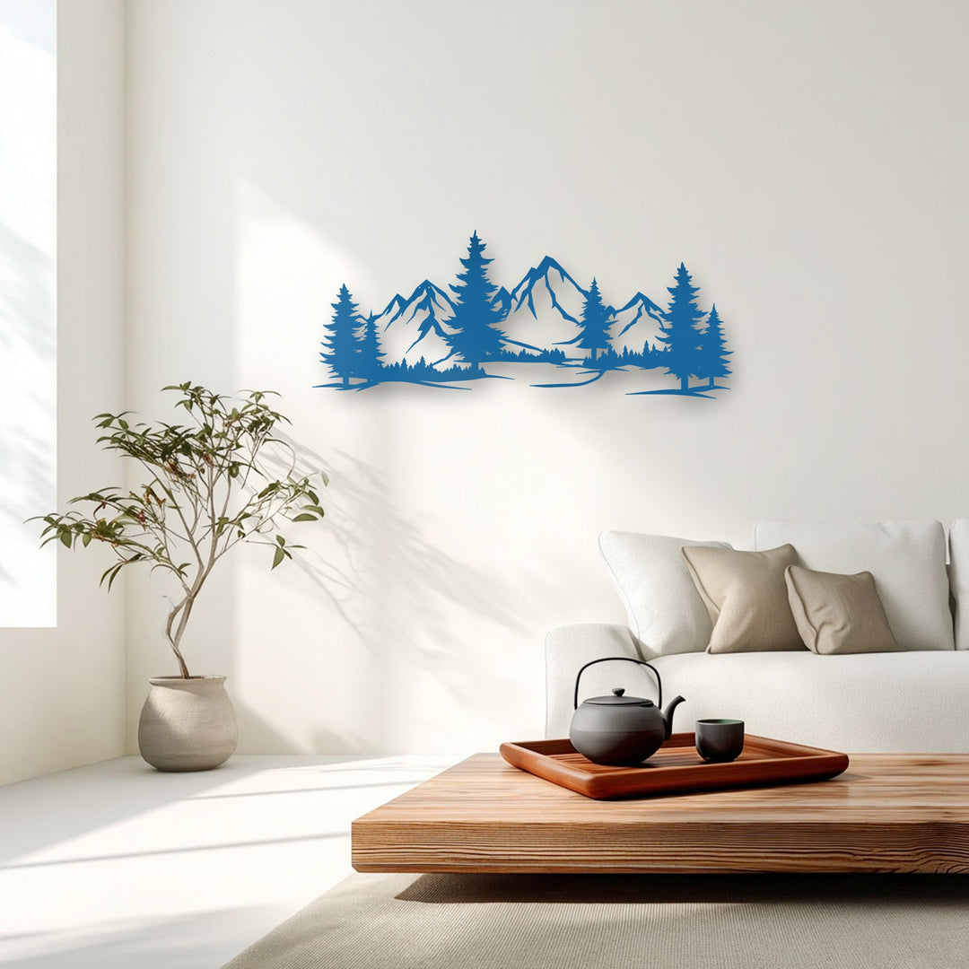 The realistic detail of the vibrant blue mountain forest decorative metal art piece showcases majestic peaks and lush pine trees.