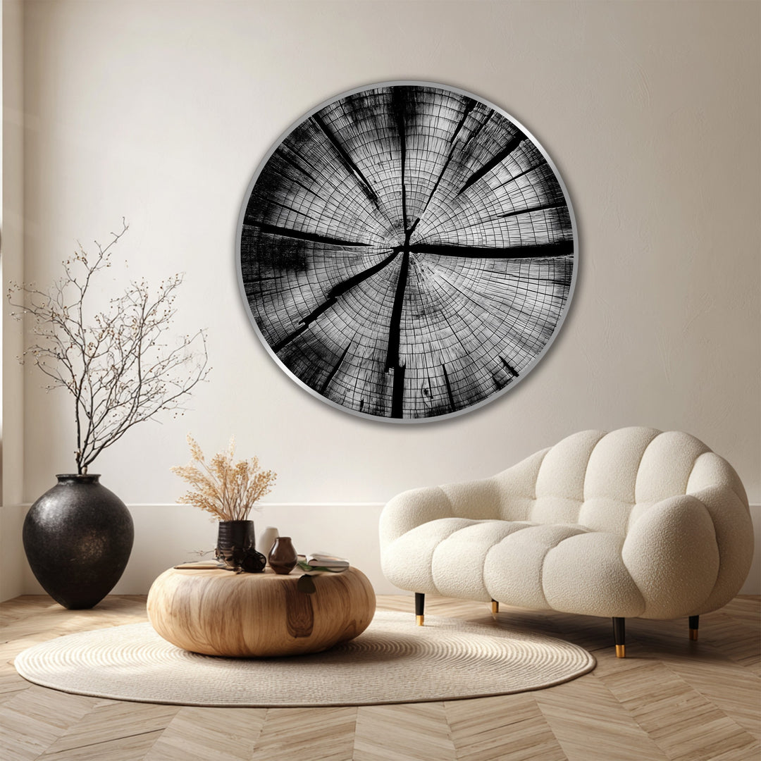 Behind the monochrome tree rings oil painting decoration, a neutral wall enhances the minimalist aesthetic of the natural-inspired art.