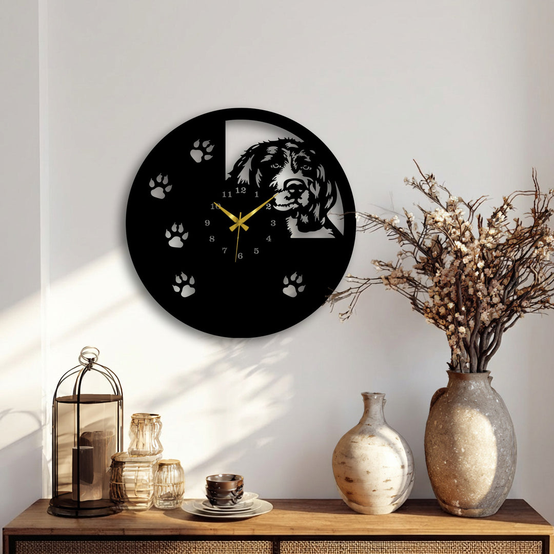 The visual rhythm of repeated paw print designs and a dog silhouette makes for captivating metal art for wall on this striking clock.