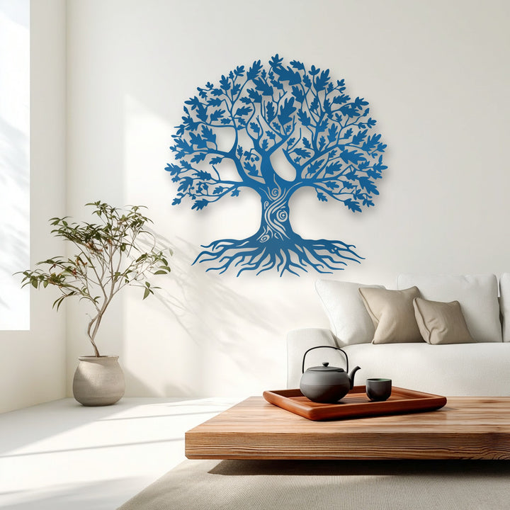 A striking blue Tree of Life decorative metal art, featuring intricate leaves and roots, displayed as a symbolic nature design.