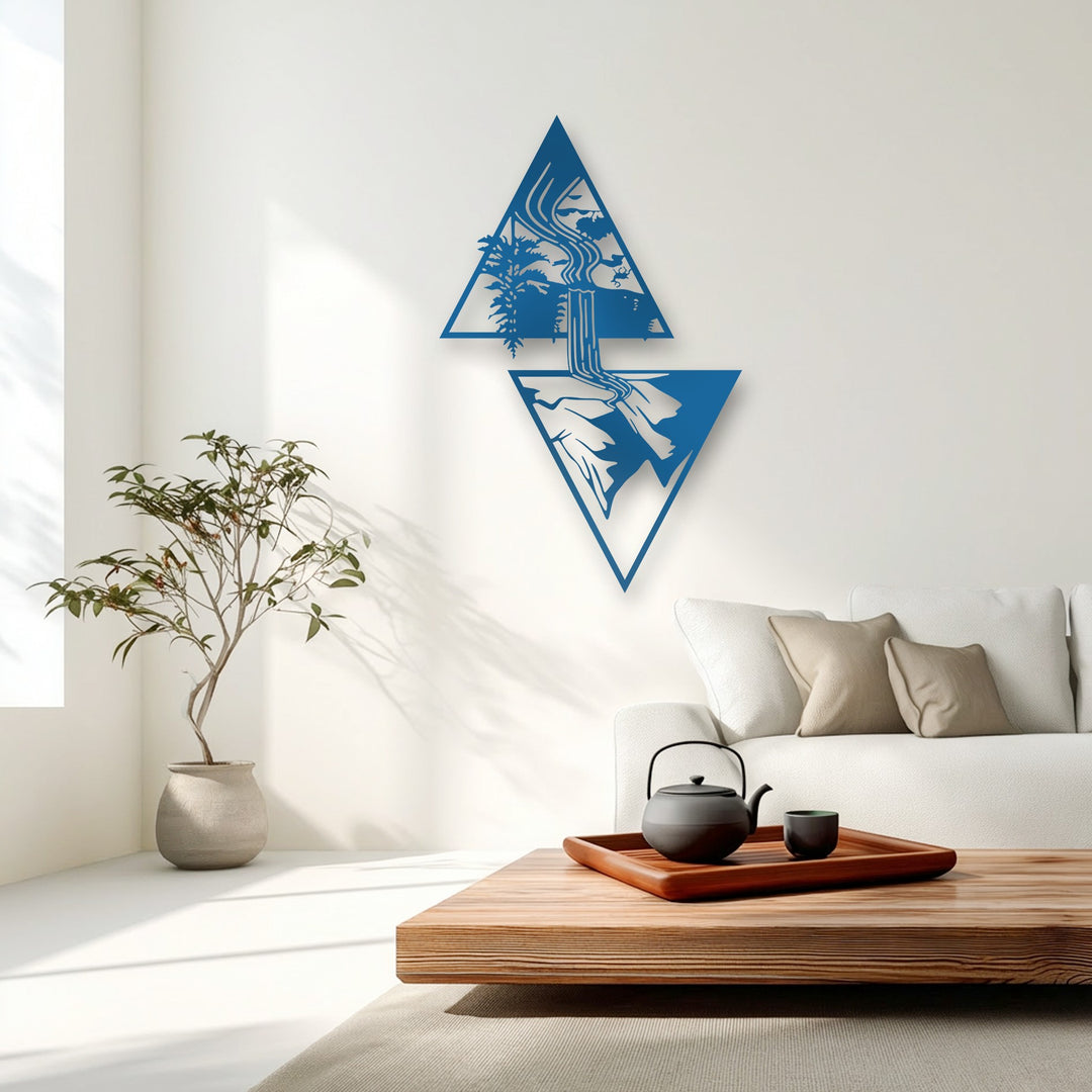 Bold blue geometric triangular elements create this stunning decorative metal art, showcasing a flowing waterfall and serene nature landscape.
