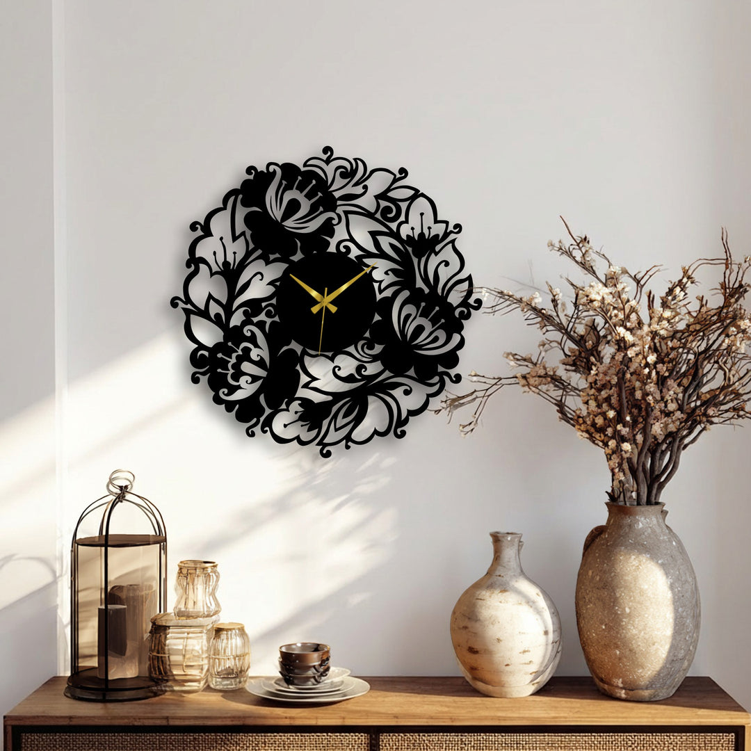 Layers of intricate metal artwork in this floral wall clock's garden design create depth, offering an elegant statement piece.