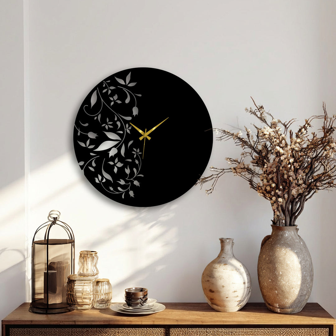 Subtle shadows highlight the softest floral details on this Floral Elegance metal wall clock, a captivating piece of metal artwork blending minimalist leaf design with a sleek, modern aesthetic.