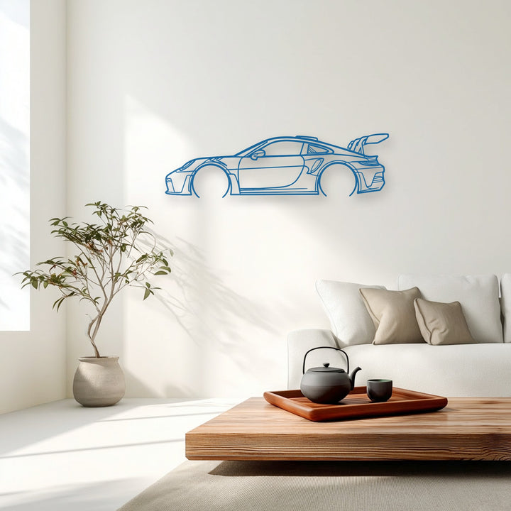 Visual rhythm is established through the sleek lines of this decorative metal art of a sport car outline, adding a modern and dynamic aesthetic to the wall.