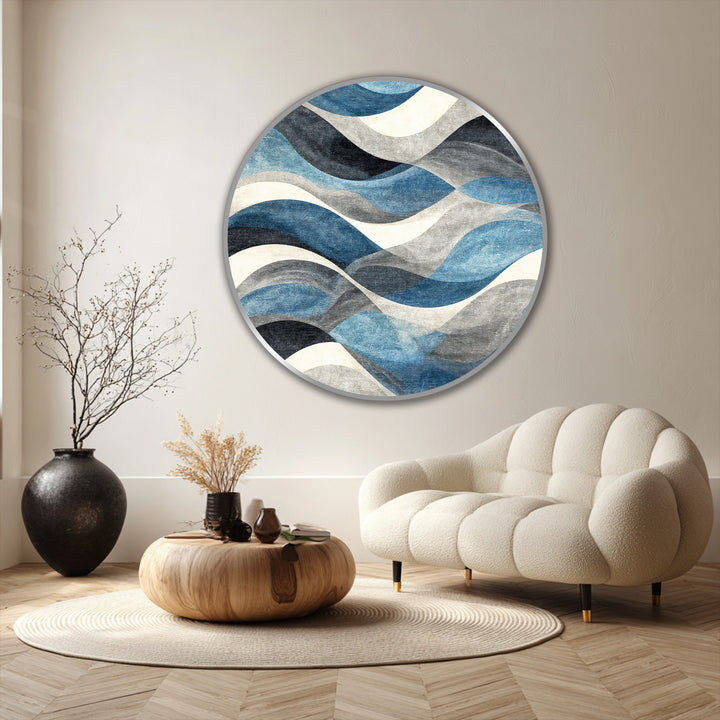 Framed with a slim silver border, this round oil painting art prints piece showcases an abstract blue ocean rhythm with an elegant, modern edge.