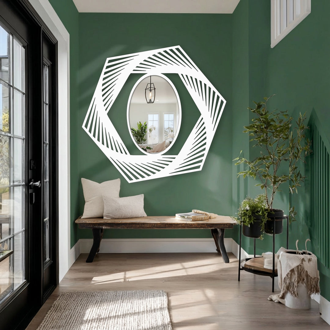Highlighting the transition from dark green wall to the decorative mirror, this dynamic hexagon illusion accentuates the home decor in the entryway.