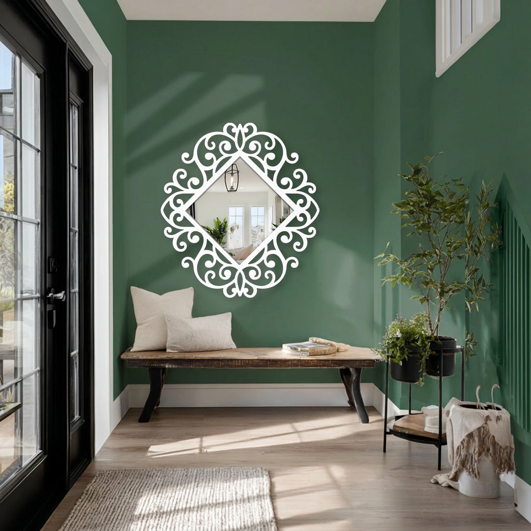 Mirror for wall decor featuring an ornamental scroll diamond design and classic baroque frame is the focal point in this stylish entryway.