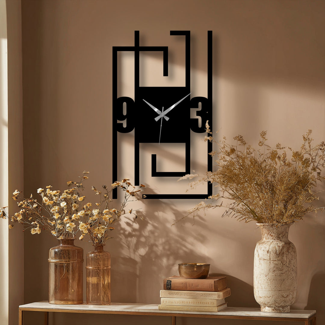 Serene decorative metal art radiates a calm, minimalist mood from this modern wall clock with its abstract frame and numeric design.