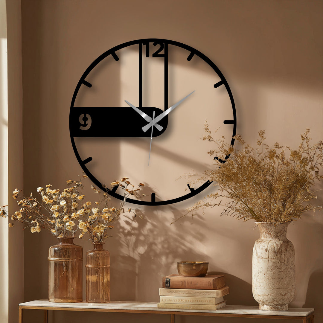Negative space highlights the minimalist design of this modern asymmetrical decorative metal art clock, creating a captivating contrast against the wall.
