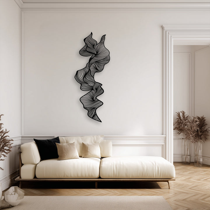Emphasizing color contrast, this vertical abstract flow unique metal wall art stands out dramatically against the light wall.